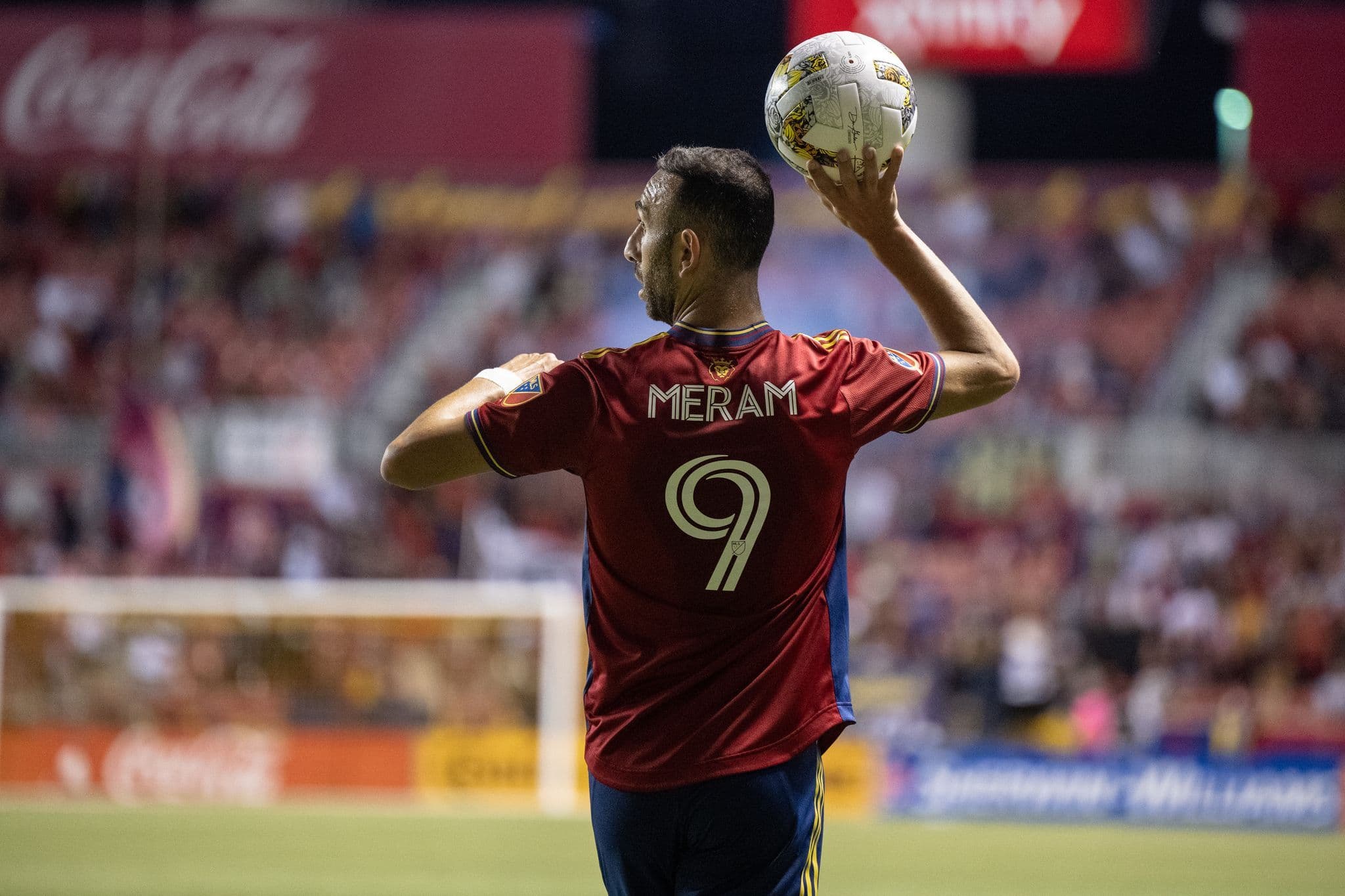 Real Salt Lake winger Justin Meram holding a soccer ball