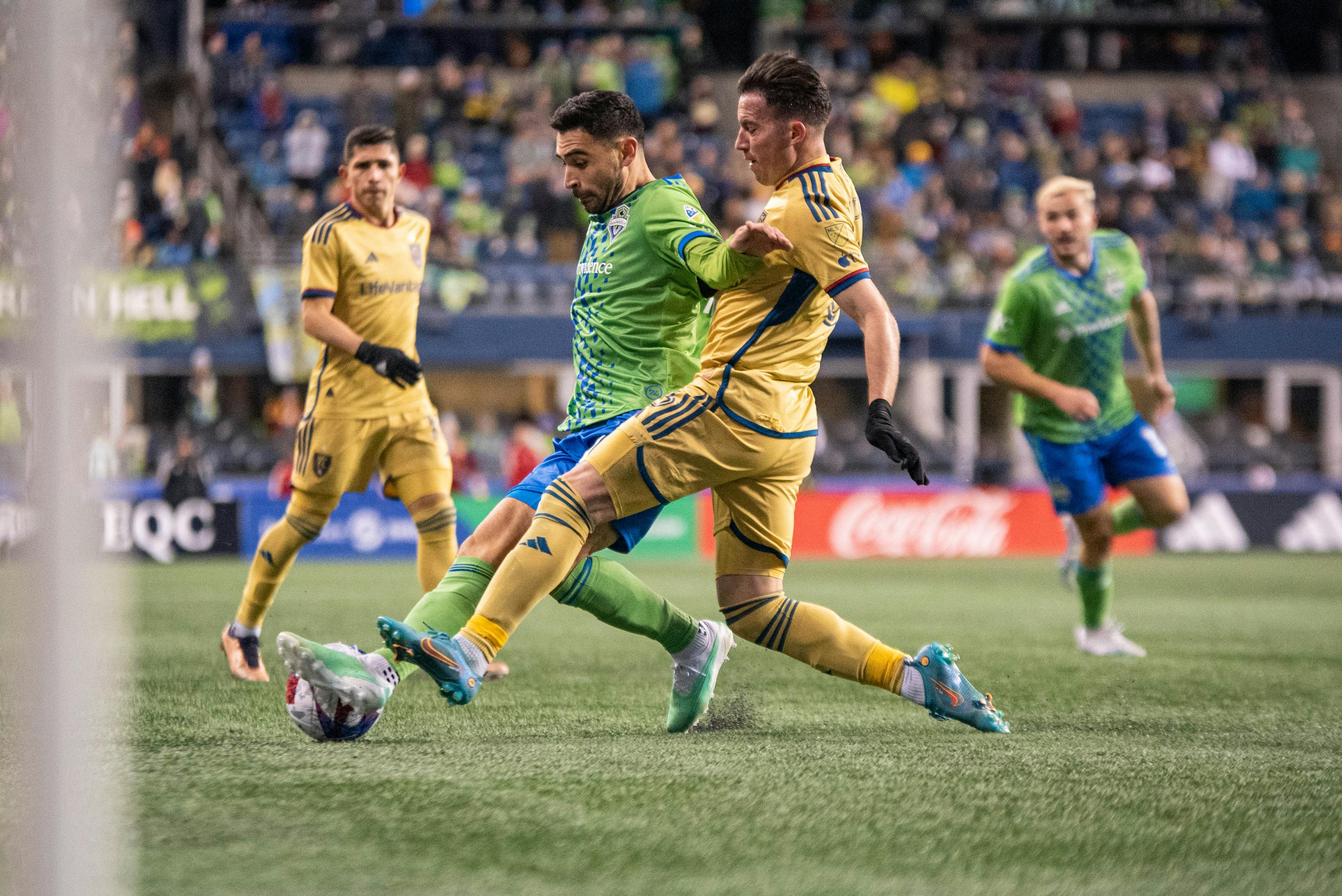 Bryan Oviedo challenges for the ball against Seattle Sounders.
