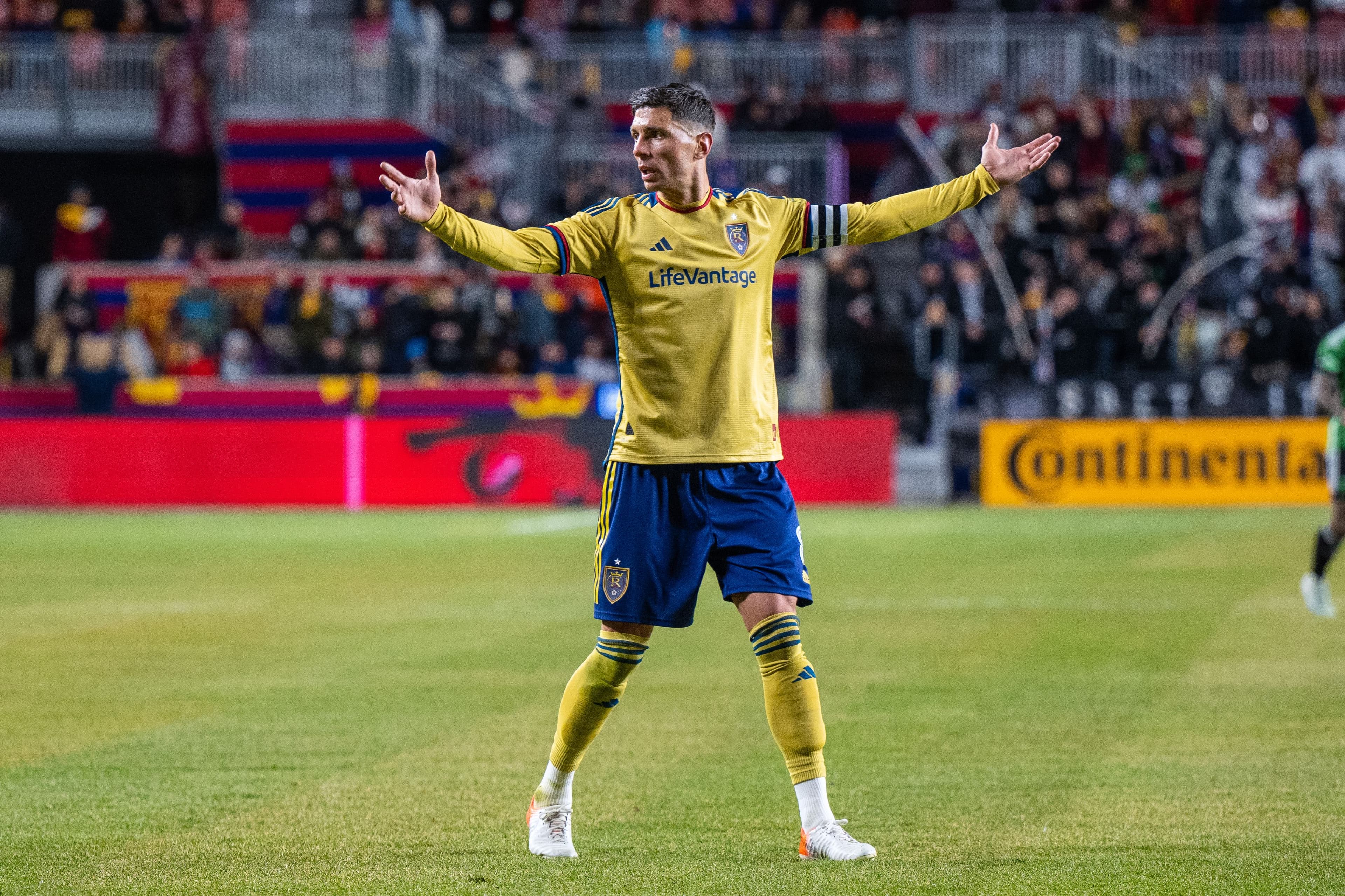 Damir Kreilach raises his arms during a match at America First Field.