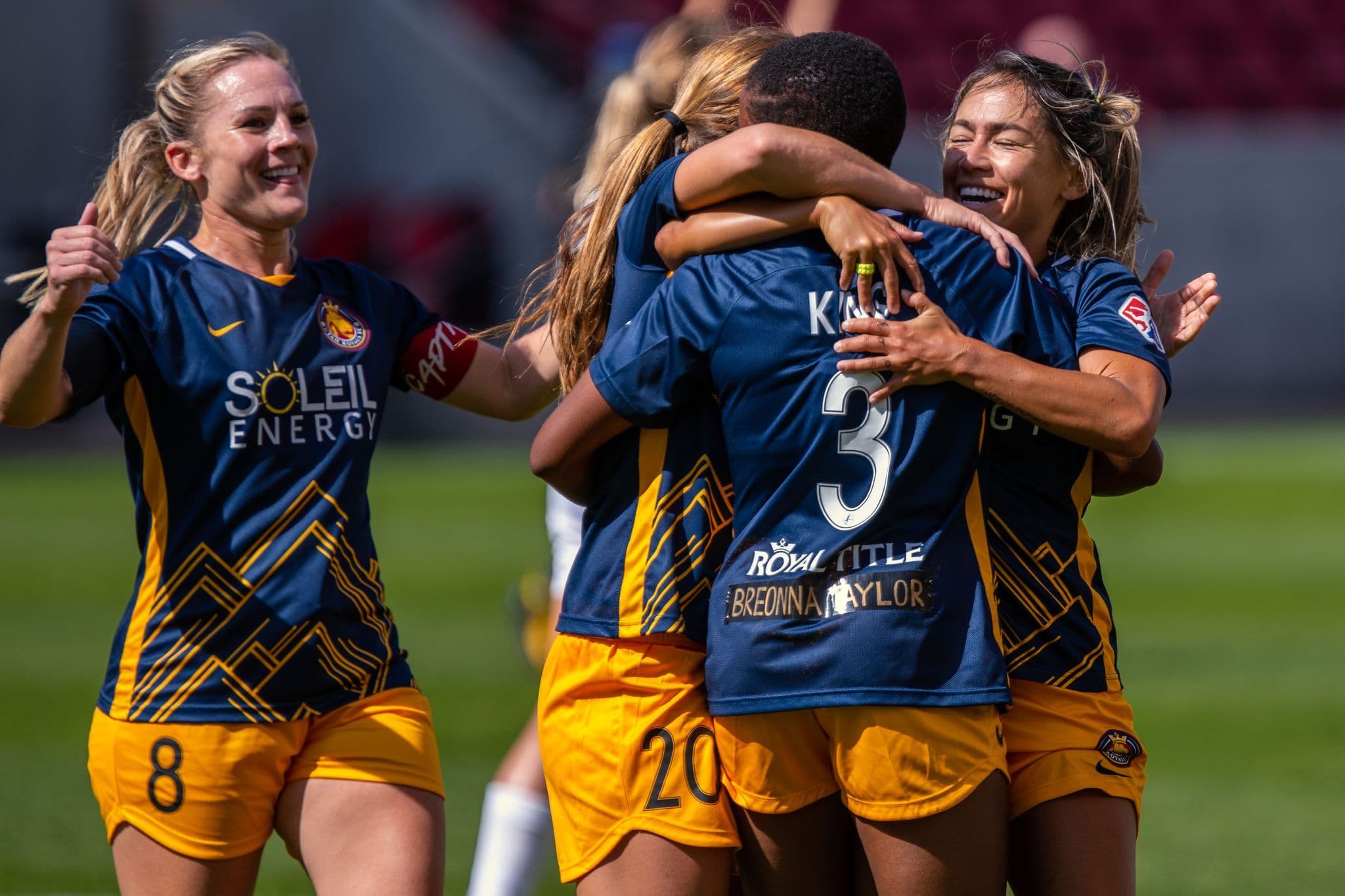 Utah Royals players celebrate a goal in 2020.