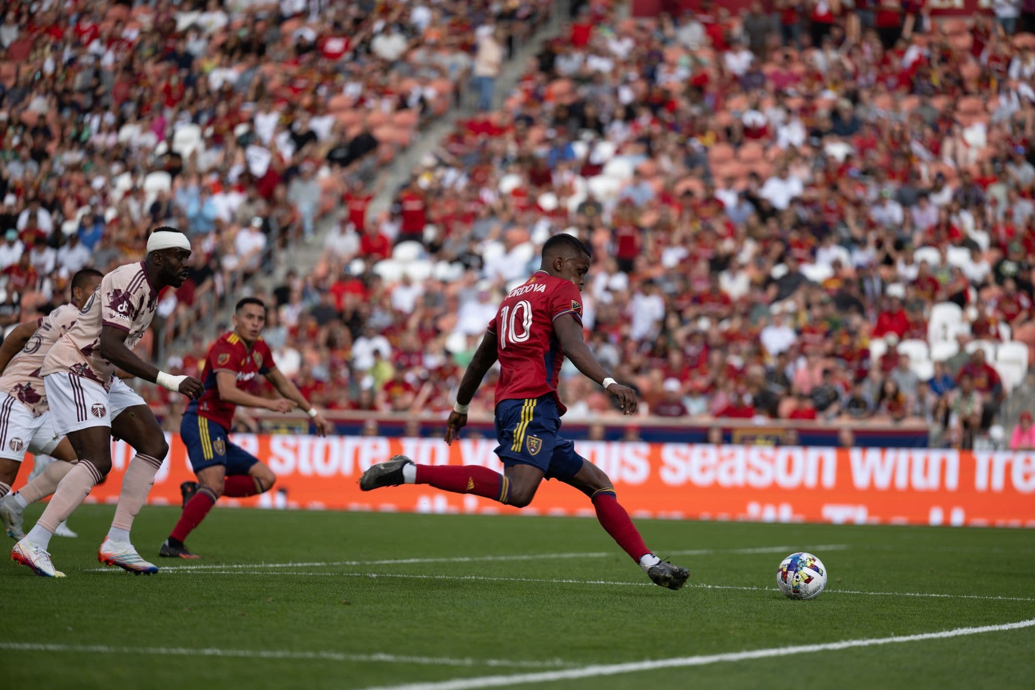 Sergio Cordova in the run of play against Portland Timbers, having separated himself from defenders